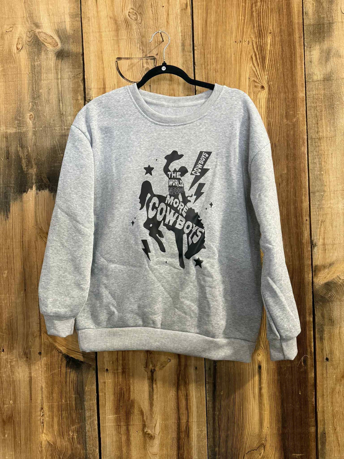 The World Needs More Cowboys Crewneck